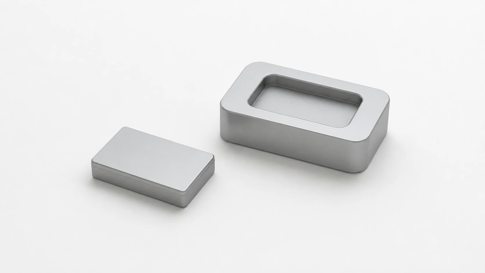 Abstract token and separate service cradle concepts on a white surface; not final hardware.
